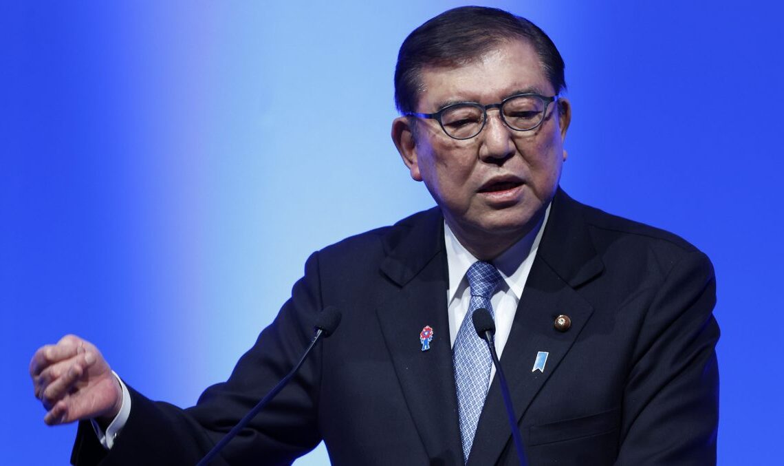 Le Premier ministre japonais répond à une question sur les ombres de croyance d'Assassin